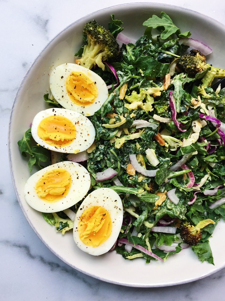 roasted broccoli salad with almonds, arugula, and hard boiled egg