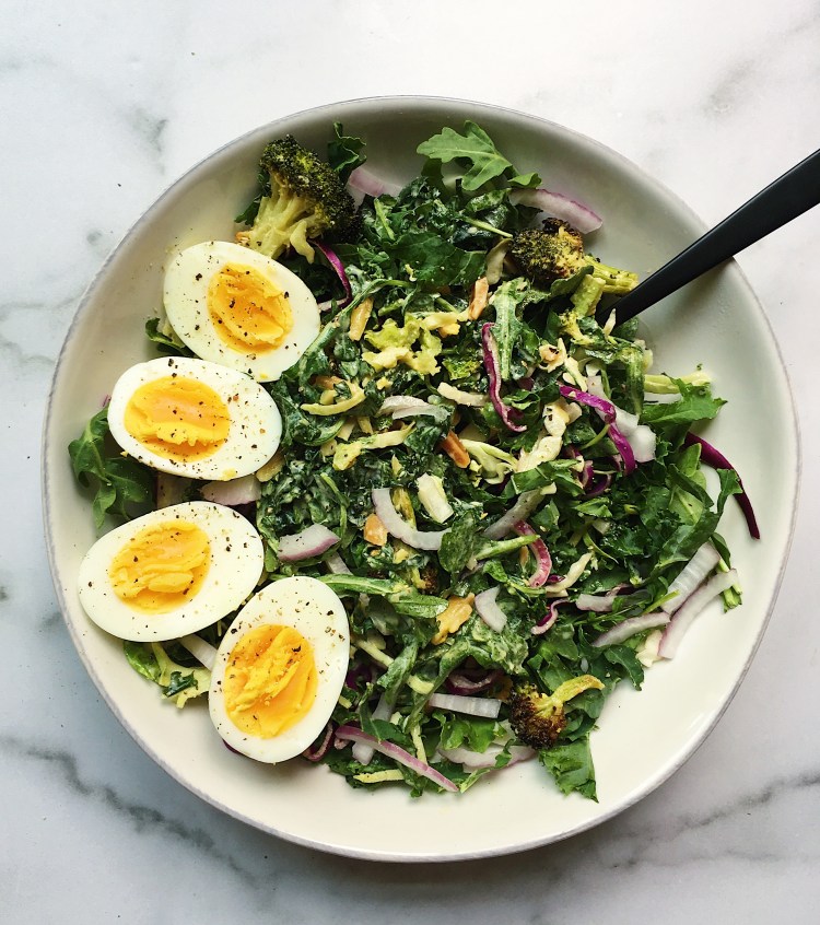 roasted broccoli salad with arugula, almonds, and hard boiled eggs
