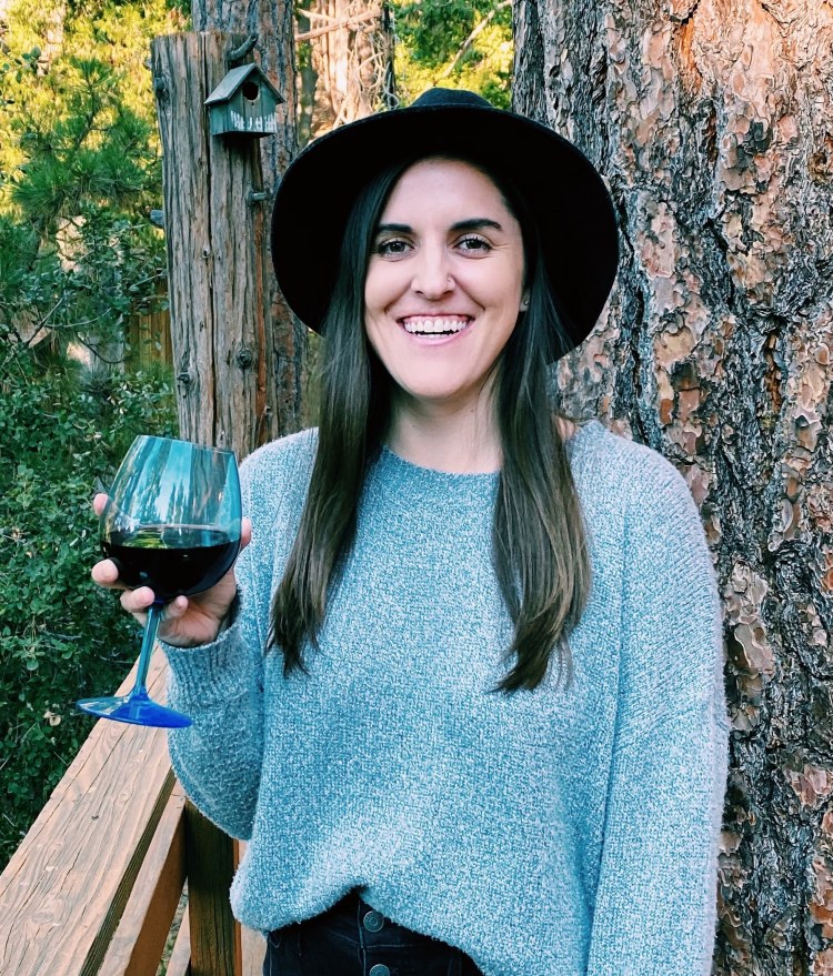 Cambria Glosz of Veggies Then Wine holding wine glass