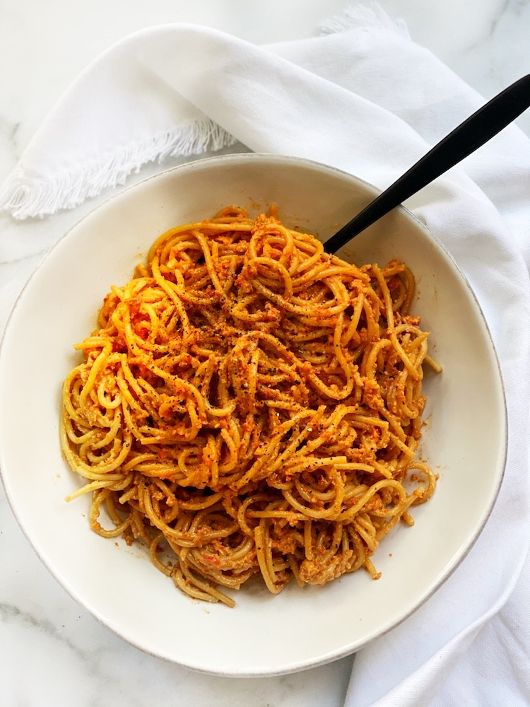 vegan red pesto with spaghetti on a plate